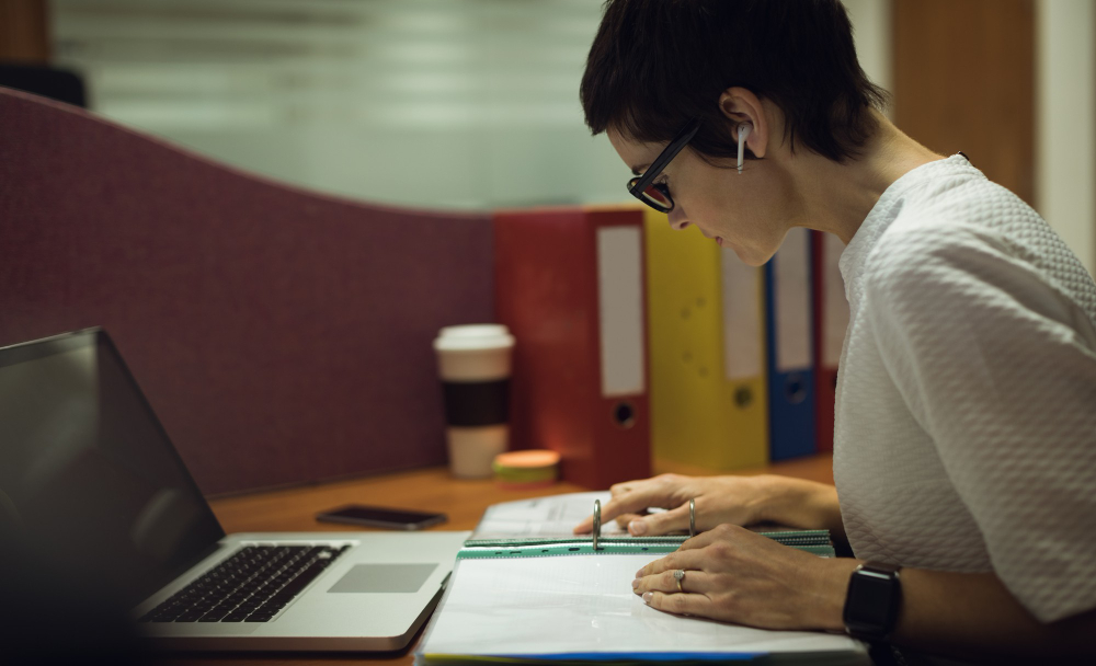 a student is doing research for medical thesis writing