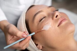 The picture of a woman having a chemical peel treatment