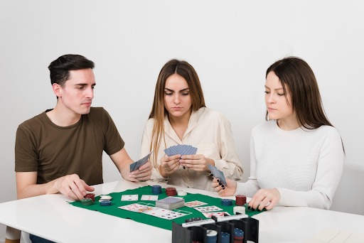Players Strategically Playing a Game of Cards